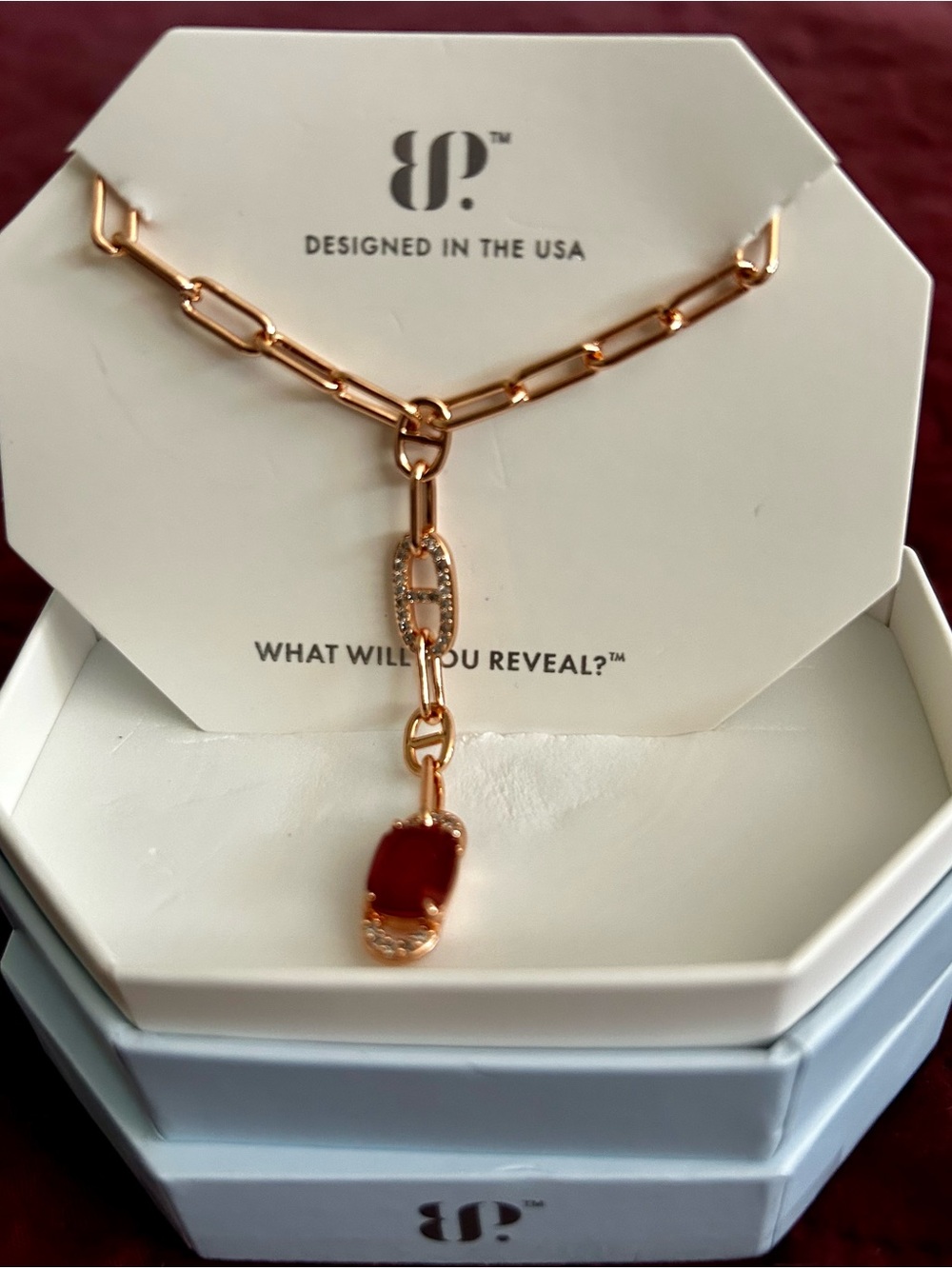 bp July birthday Lab created ruby fused with genuine quartz. Rose gold plating